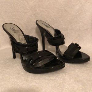 Carlos Santana black Spark heels